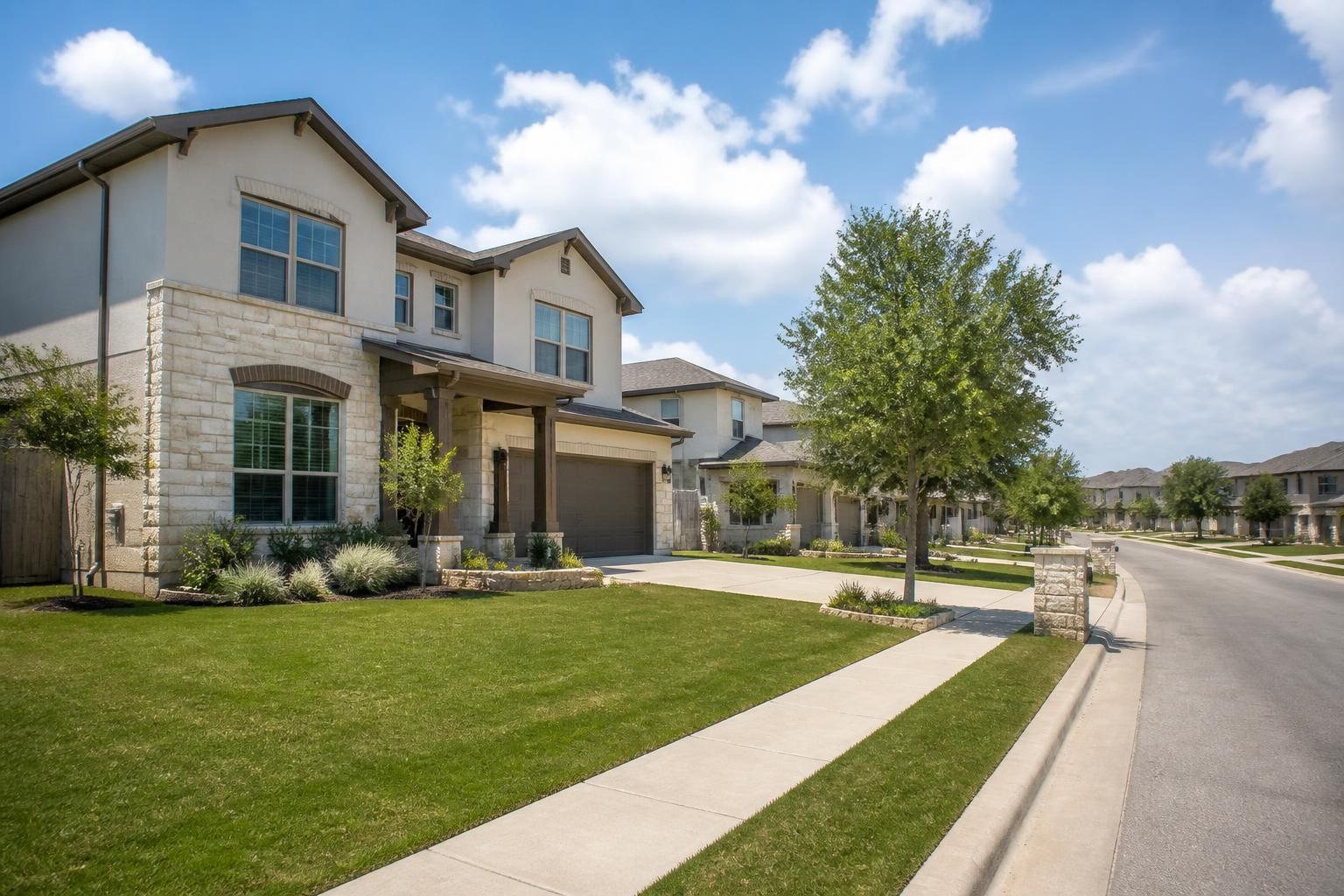 Well-kept homes in a bright Leander neighborhood.